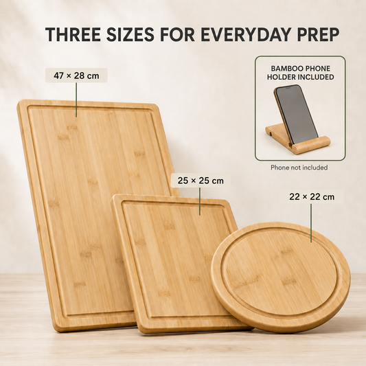 Three bamboo cutting boards in rectangular, square and round sizes with bamboo phone holder