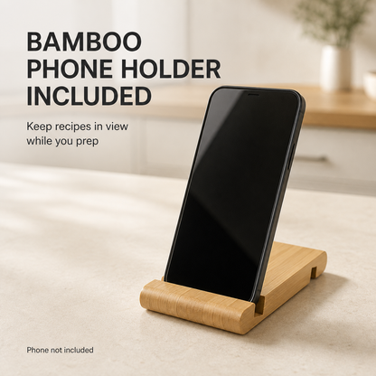 Bamboo mobile phone holder on a kitchen bench with the phone screen switched off