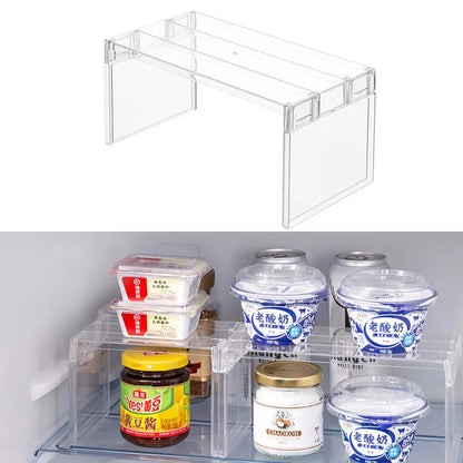 Clear freestanding shelf riser for organising items inside a refrigerator