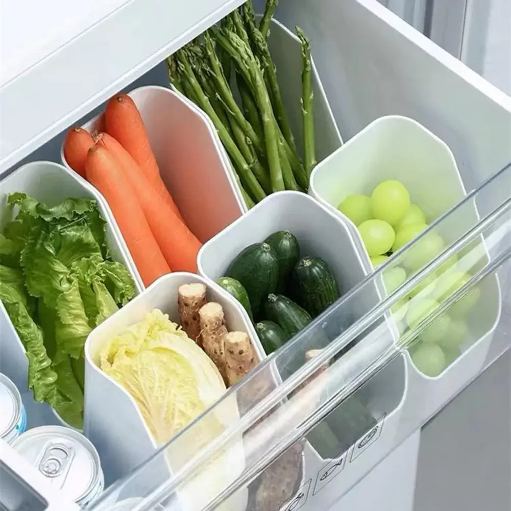 Clear compact fridge organiser bins holding vegetables and smaller fridge essentials