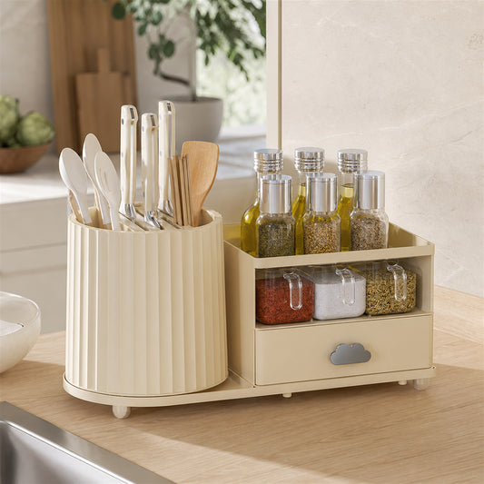 Cream rotating countertop organiser holding utensils and everyday kitchen essentials on a benchtop