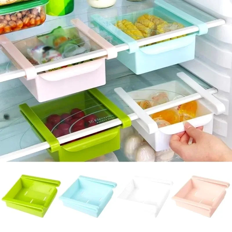 Colourful sliding refrigerator drawers fitted beneath fridge shelves