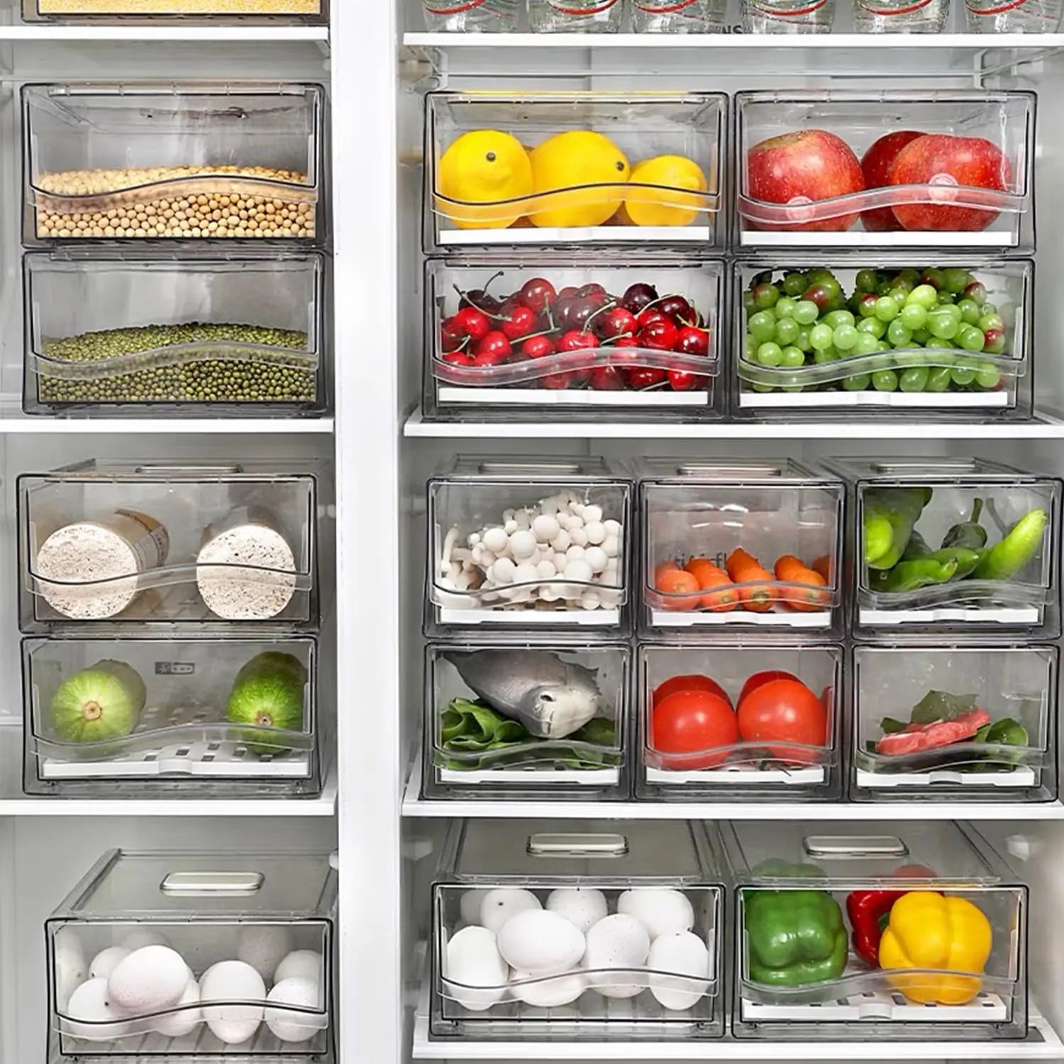 Clear pull-out fridge drawers organising fruit, vegetables and packaged groceries