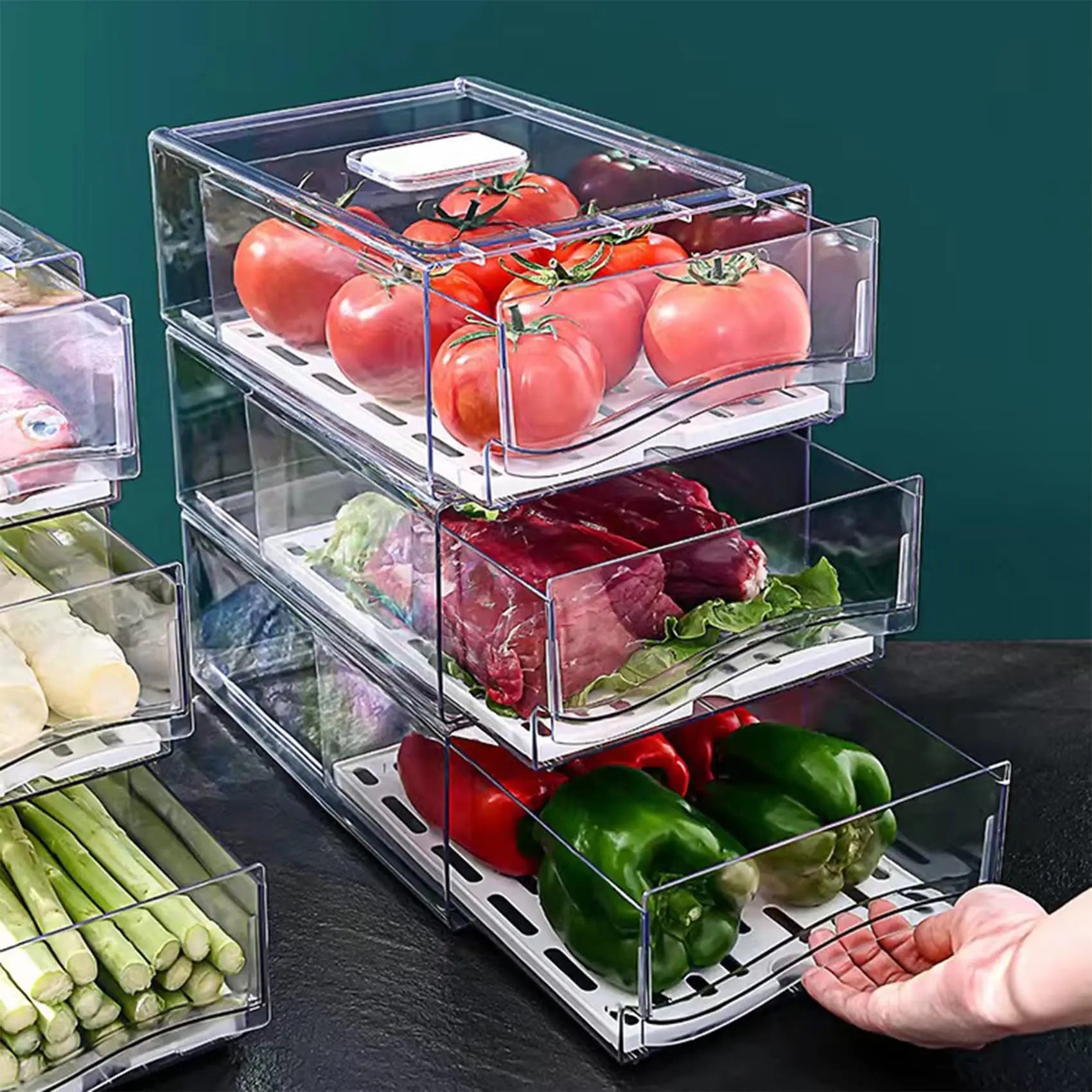 Clear stackable fridge drawers holding tomatoes, vegetables and chilled groceries