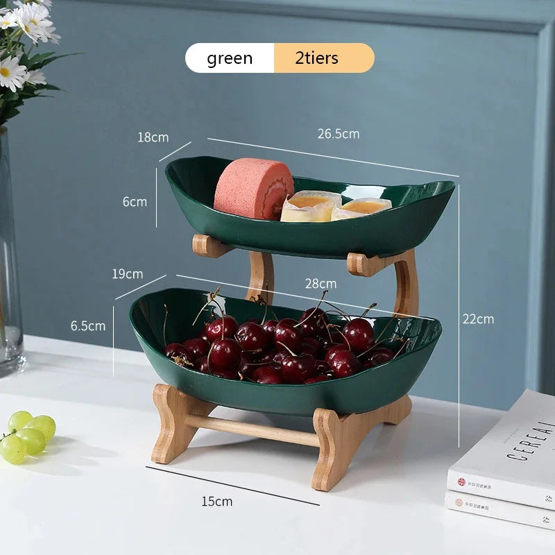 Green two-tier serving stand dimensions: approximately 28 centimetres wide, 19 centimetres deep and 22 centimetres high