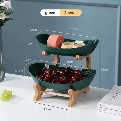 Green two-tier serving stand dimensions: approximately 28 centimetres wide, 19 centimetres deep and 22 centimetres high